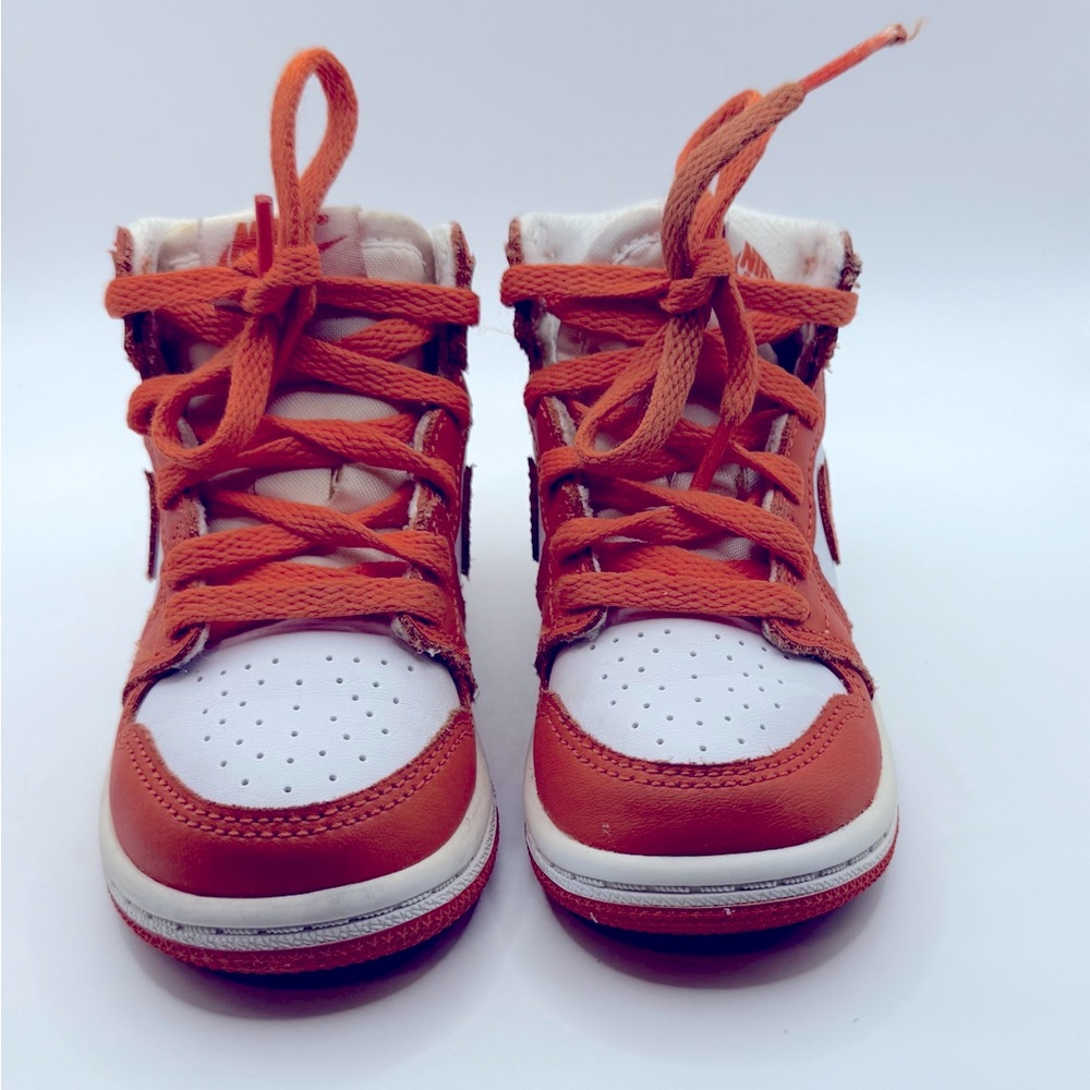 Orange and white Jordan 1’s